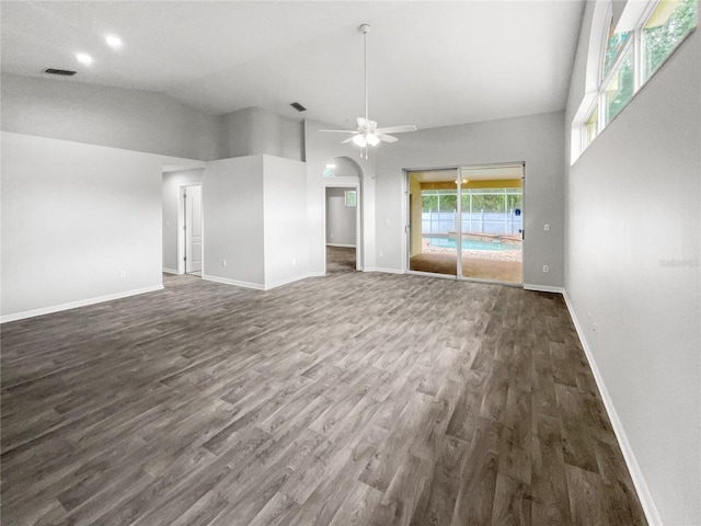 unfurnished living room featuring ceiling fan, high vaulted ceiling, and dark hardwood / wood-style floors