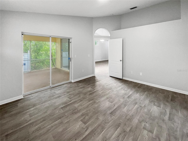 empty room featuring dark hardwood / wood-style floors