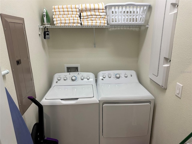 laundry room with laundry area and separate washer and dryer