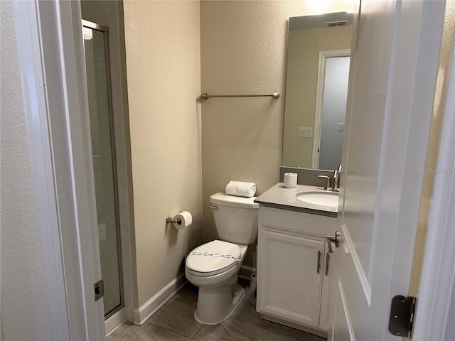 full bathroom featuring visible vents, a textured wall, toilet, vanity, and tile patterned flooring