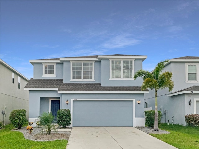 view of front of home with a garage