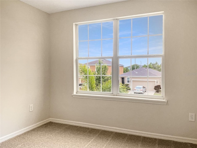 empty room featuring carpet