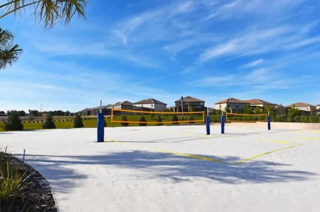 view of property's community featuring volleyball court