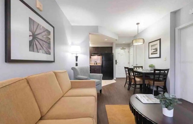 living room with hardwood / wood-style flooring