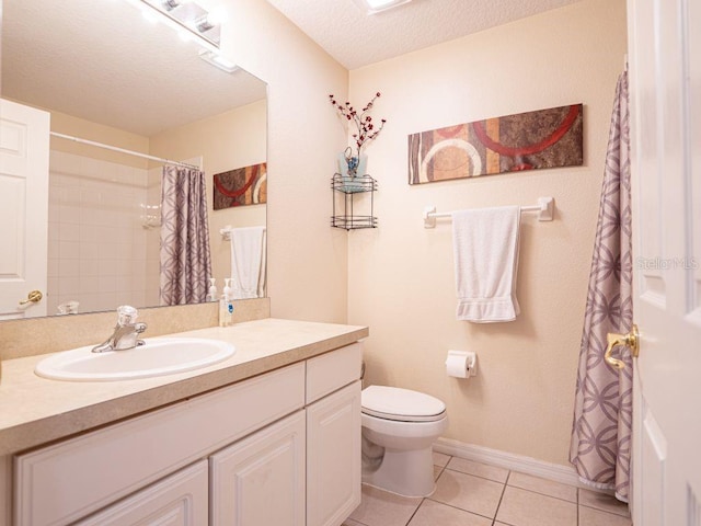 bathroom featuring curtained shower, tile patterned flooring, a textured ceiling, toilet, and vanity