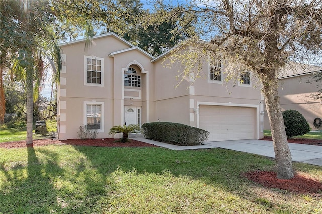 view of front of home featuring a front lawn and a garage