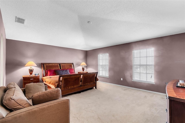 bedroom featuring light colored carpet