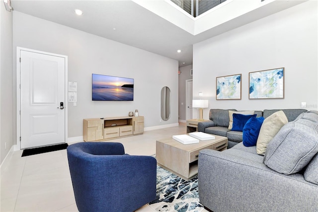 living room with tile patterned floors