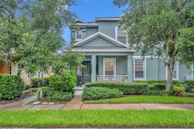 view of front of home featuring covered porch