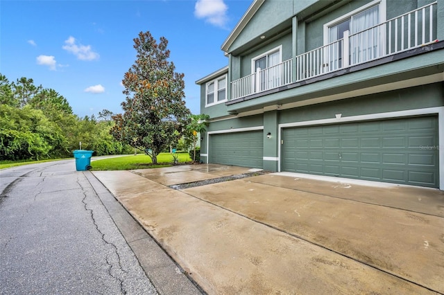 view of property exterior featuring a garage