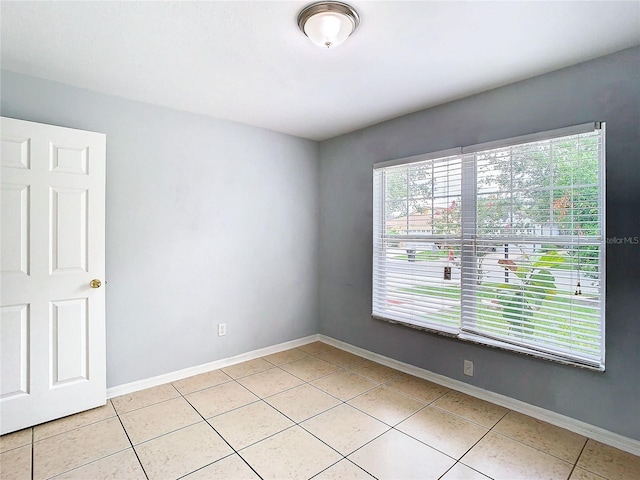 view of tiled spare room