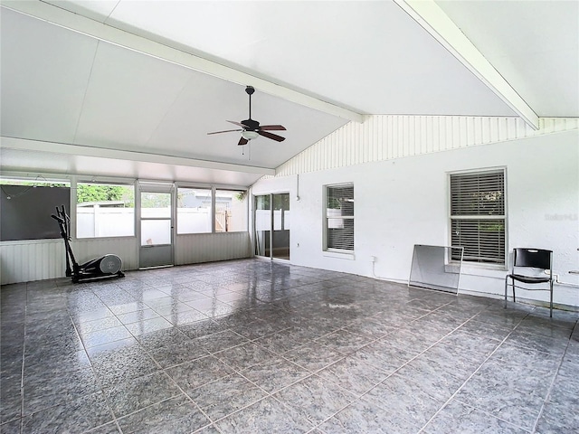 exterior space featuring vaulted ceiling with beams and ceiling fan