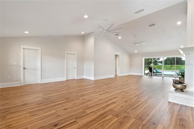 unfurnished living room featuring ceiling fan, light wood-type flooring, and high vaulted ceiling