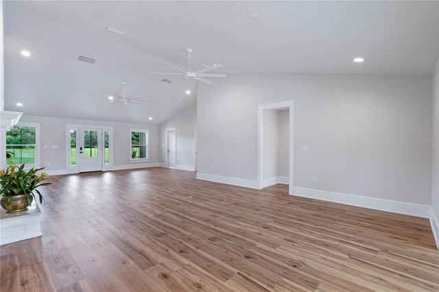 unfurnished living room featuring ceiling fan, light hardwood / wood-style floors, and lofted ceiling