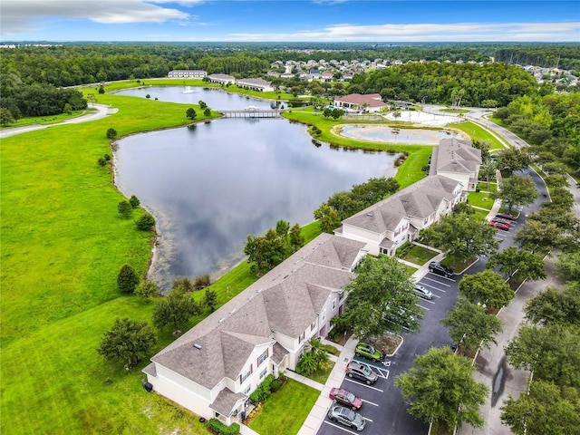 bird's eye view with a water view