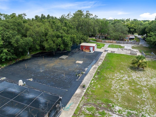 view of swimming pool with an outdoor structure