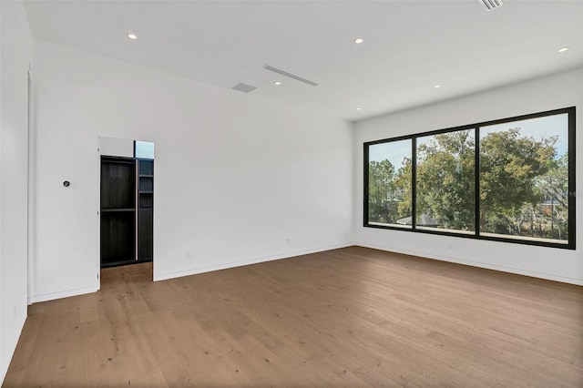 empty room with light wood-type flooring