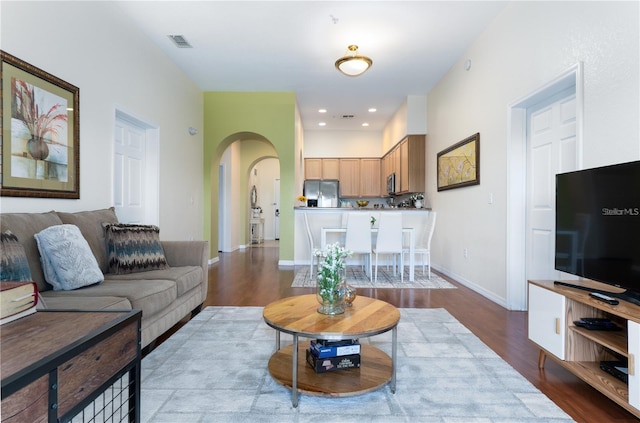 living room with hardwood / wood-style floors