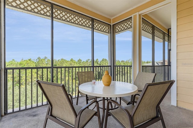 sunroom / solarium featuring a wealth of natural light