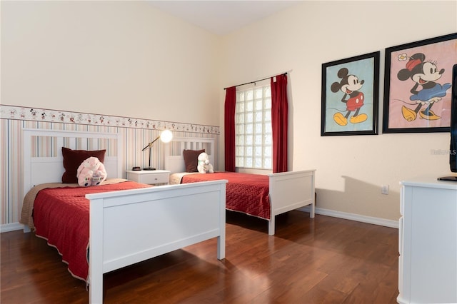 bedroom featuring dark hardwood / wood-style flooring