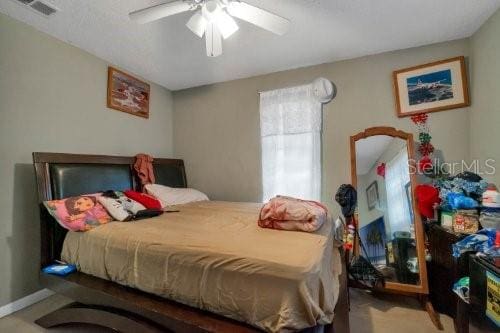 bedroom featuring ceiling fan