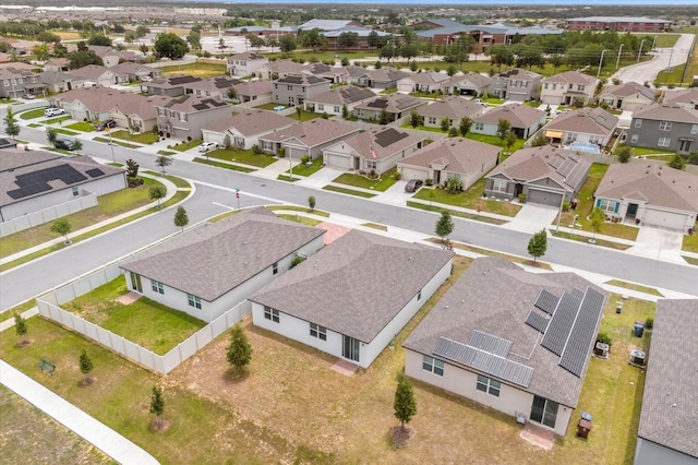 drone / aerial view with a residential view