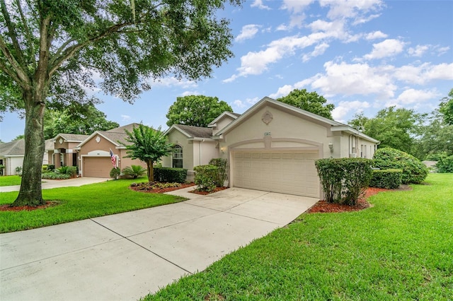 ranch-style home with a garage and a front lawn