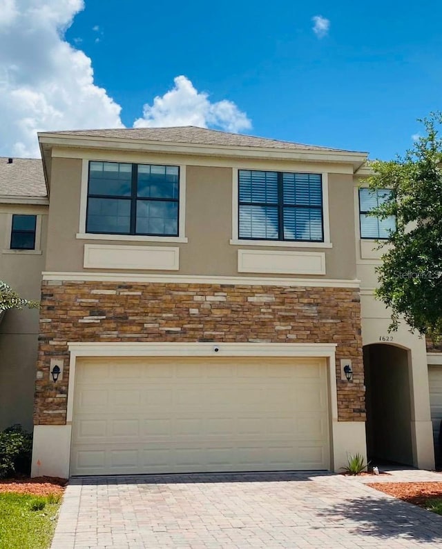 view of front of property featuring a garage