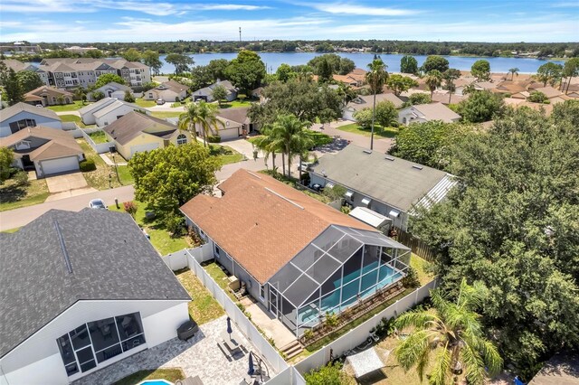 birds eye view of property featuring a water view