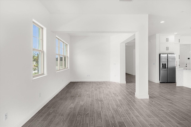 spare room with hardwood / wood-style flooring