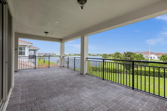 balcony featuring a water view