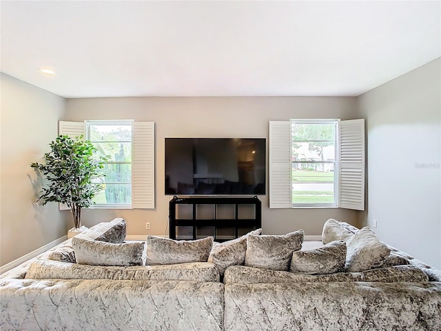 living room featuring a healthy amount of sunlight