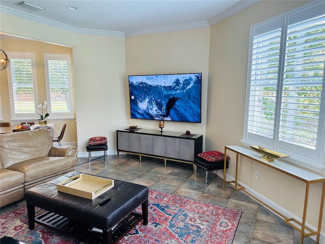 living room featuring visible vents, stone finish floor, crown molding, and baseboards