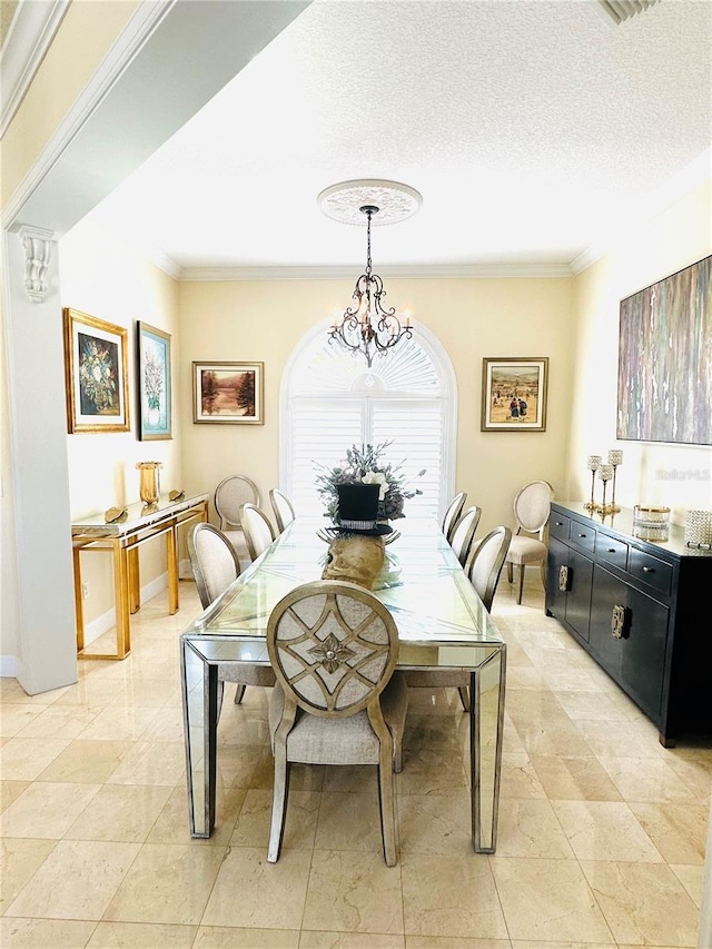 dining area with an inviting chandelier, ornamental molding, baseboards, and a textured ceiling