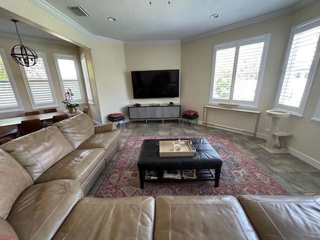 8734 Crestgate Cir, Orlando, FL 32819 - living room with a chandelier, baseboards, crown molding, stone tile floors, and a textured ceiling