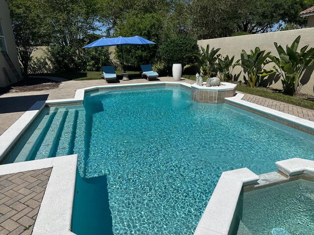 8734 Crestgate Cir, Orlando, FL 32819 - view of swimming pool with a fenced backyard