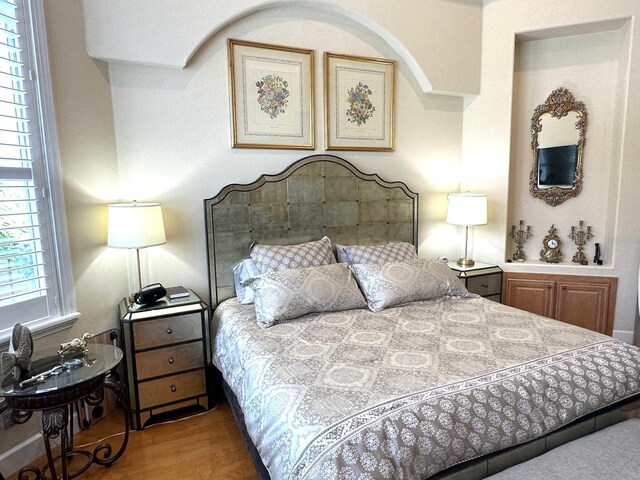 8734 Crestgate Cir, Orlando, FL 32819 - bedroom with wood finished floors