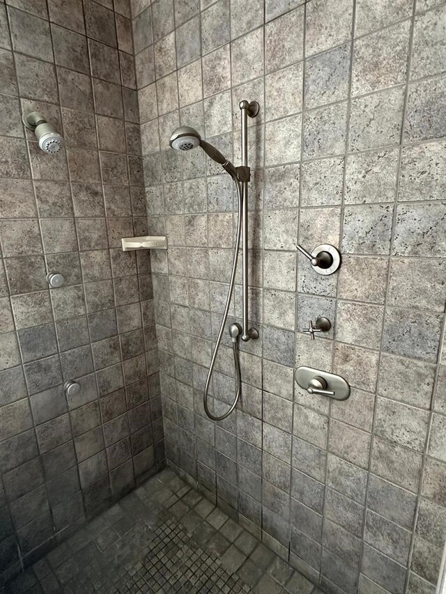 8734 Crestgate Cir, Orlando, FL 32819 - bathroom with tiled shower