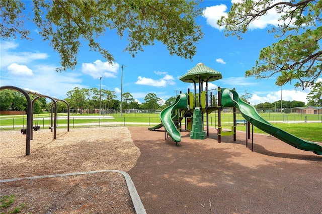 view of play area with a yard