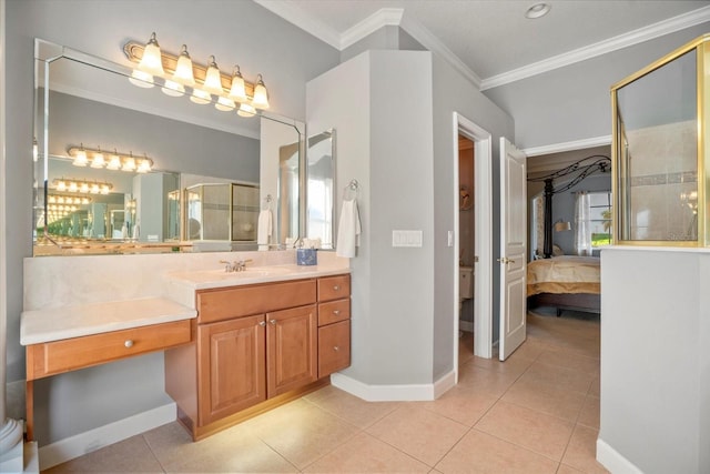 bathroom with ornamental molding, vanity, tile patterned floors, and a shower with shower door