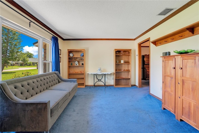 living room featuring crown molding, carpet floors, and a textured ceiling