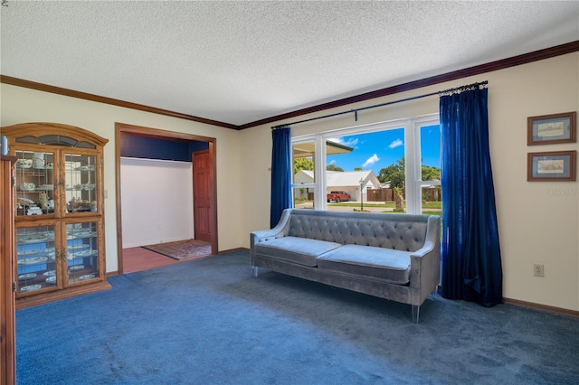 living area with a textured ceiling, dark carpet, and crown molding