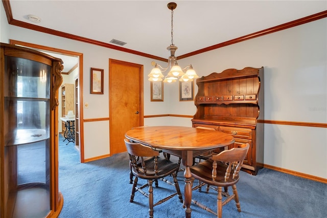 carpeted dining area featuring an inviting chandelier and ornamental molding