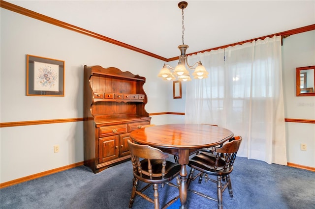 dining room with an inviting chandelier, dark carpet, and ornamental molding