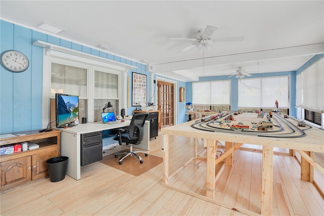 rec room with ceiling fan, light hardwood / wood-style flooring, and french doors