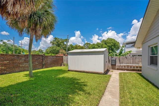 view of yard with a storage shed