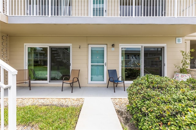 property entrance with a patio area