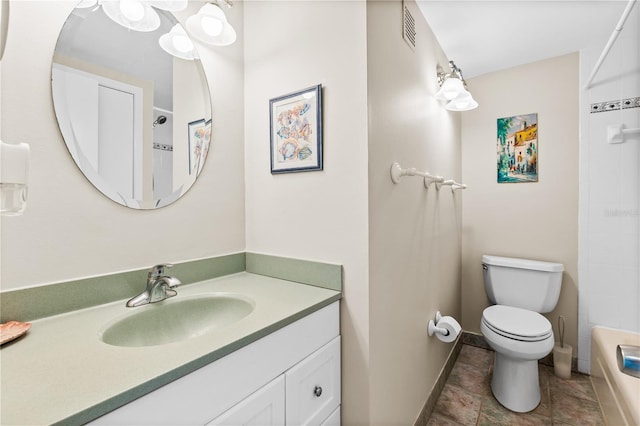 full bathroom featuring tub / shower combination, toilet, and vanity