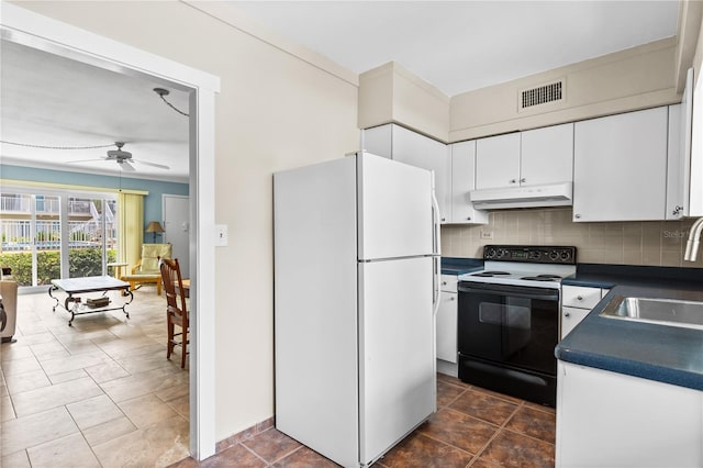 kitchen with white cabinets, white refrigerator, sink, range with electric stovetop, and ceiling fan