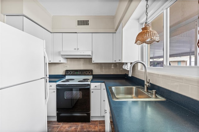 kitchen with white cabinetry, decorative backsplash, electric range oven, white refrigerator, and sink